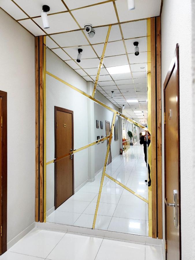 Asem Hotel นูกุส ภายนอก รูปภาพ
