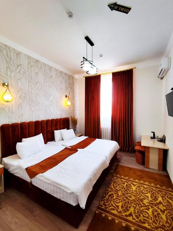 Asem Hotel นูกุส ภายนอก รูปภาพ