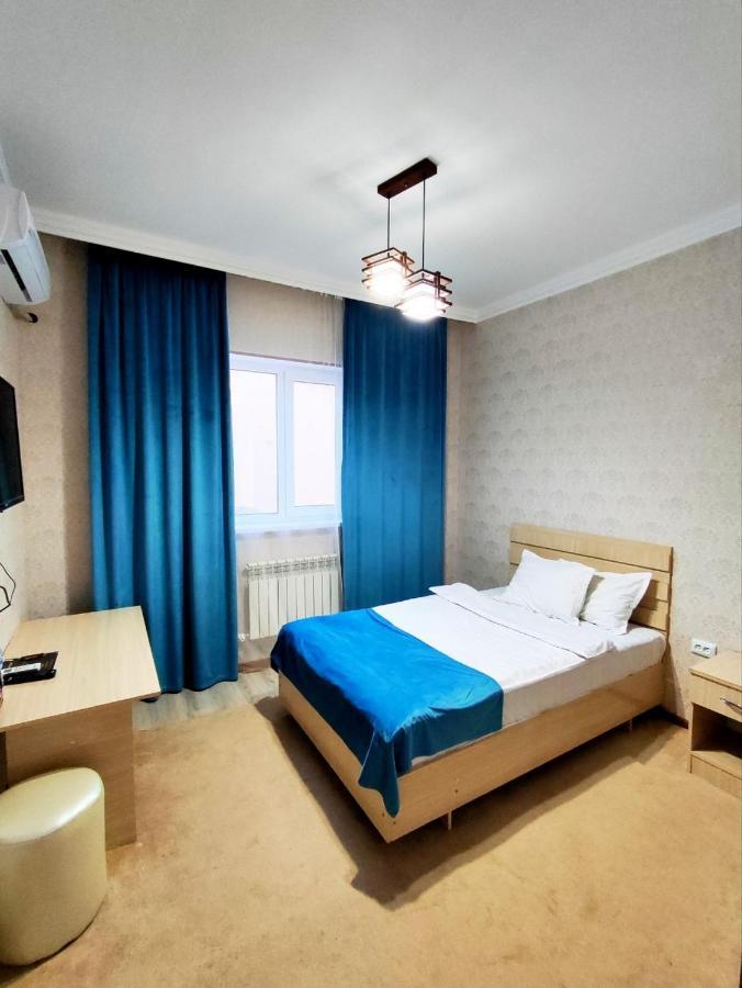 Asem Hotel นูกุส ภายนอก รูปภาพ
